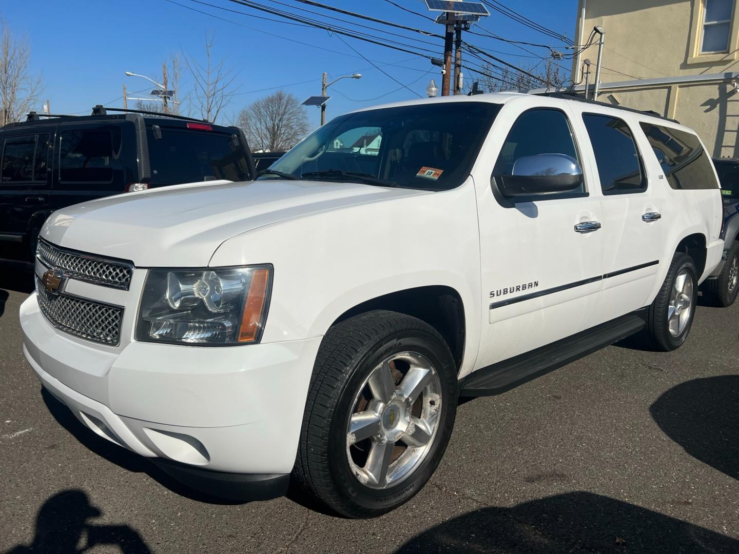 2014 White /Black Leather Chevrolet Suburban LTZ 1500 4WD (1GNSKKE77ER) with an 5.3L V8 OHV 16V FFV engine, 6 SPEED AUTOMATIC transmission, located at 1018 Brunswick Ave, Trenton, NJ, 08638, (609) 989-0900, 40.240086, -74.748085 - Photo#0